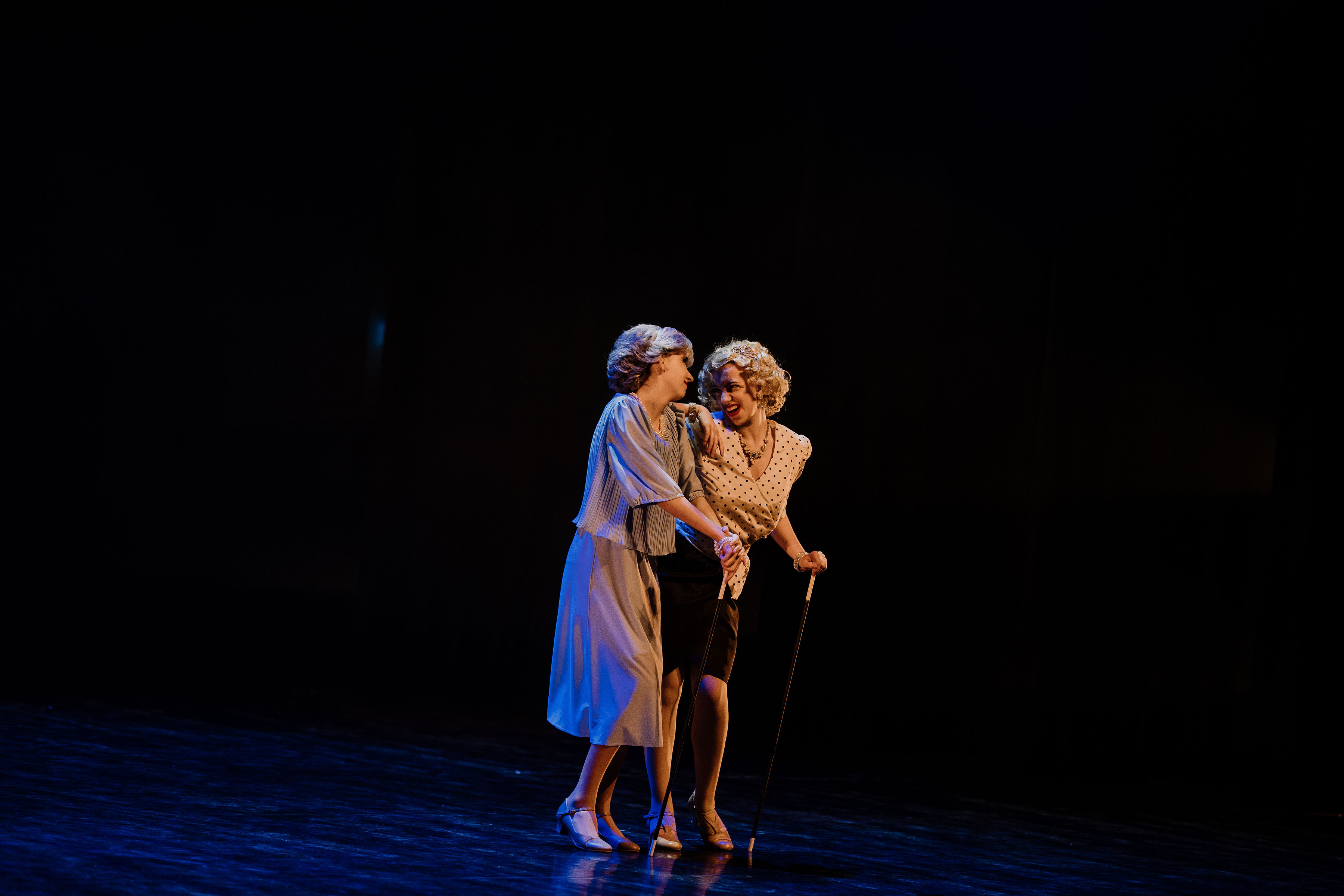 Two dancers dressed as seniors for their musical theatre duet