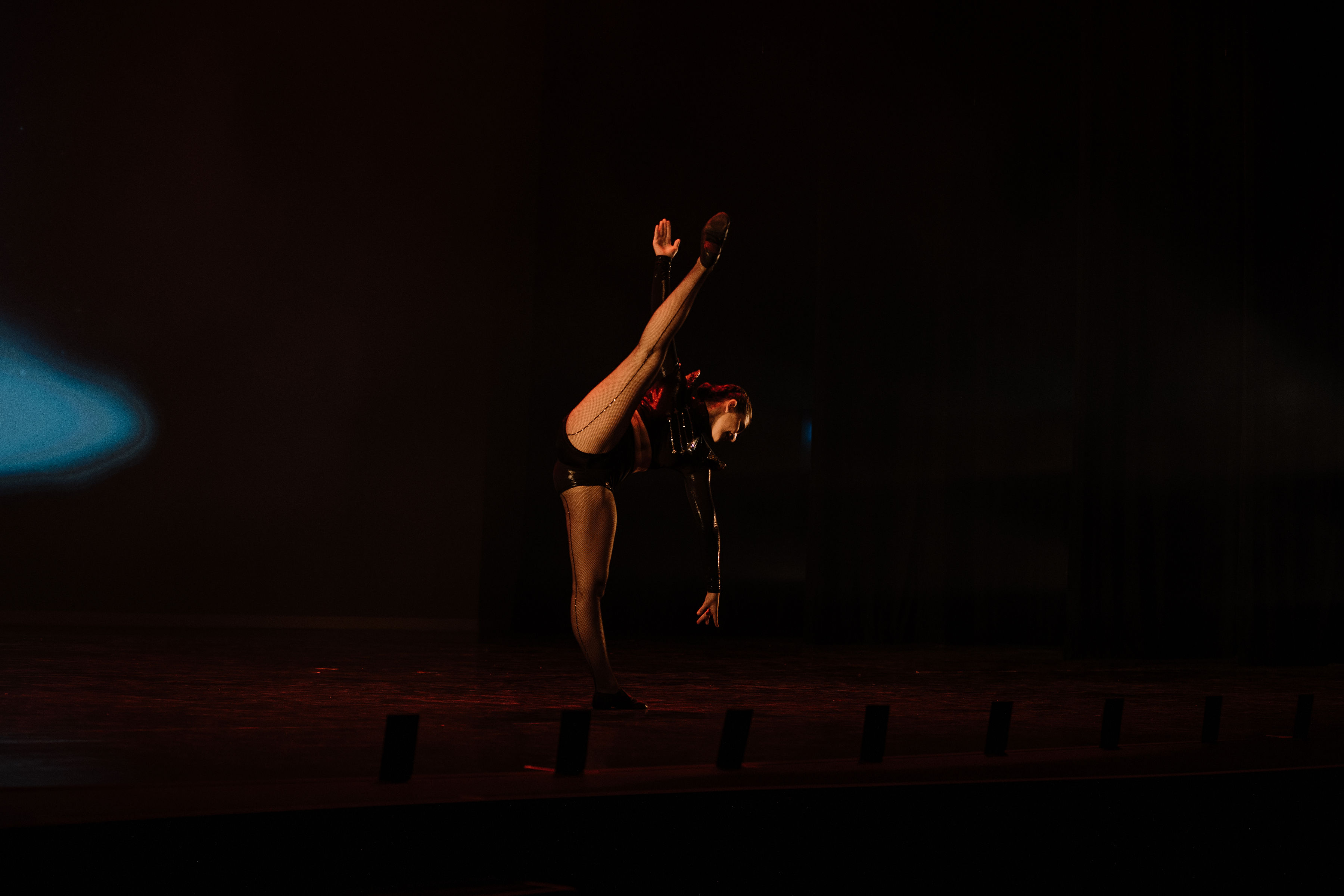 Dancer performing jazz solo on stage